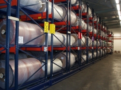 Mobile rack for material storage in reels.